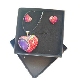Rubylishious 
Silver set of earrings and pendant purple amethys heart shape with